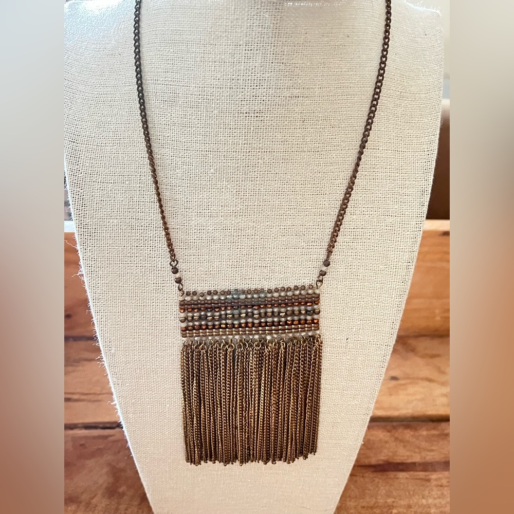 Beaded copper, white and gold necklace with fringe. Lobster clasp.